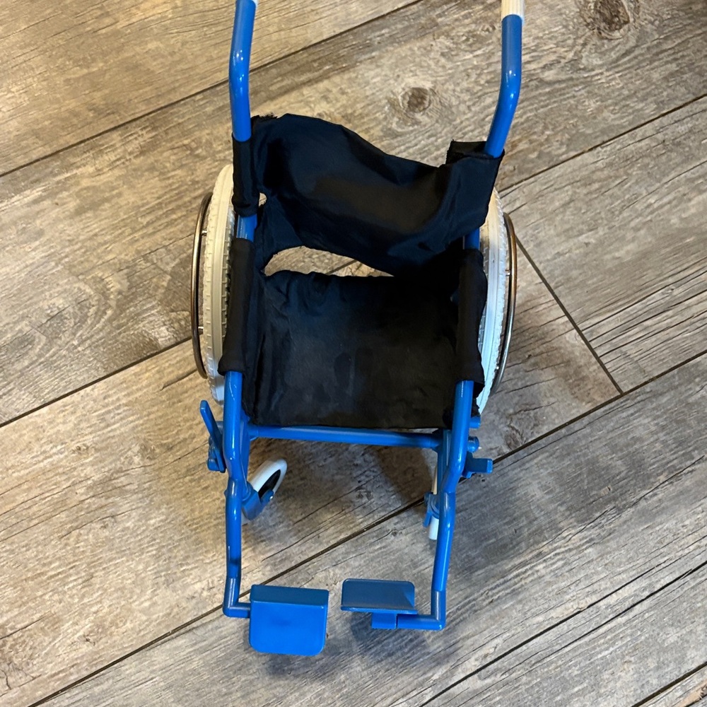 Blue and Black Toy Wheelchair